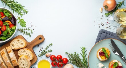 A table setting with a plate of bruschetta, bread, and fresh vegetables on a light blue background.