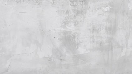 Naklejka premium Textured light gray concrete wall with visible scuffs and marks