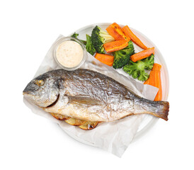 Tasty grilled fish, vegetables and sauce isolated on white, top view