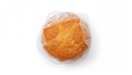 Close-up of a packaged round loaf of bread isolated on a white surface, viewed from above