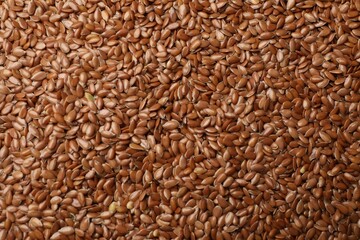 Many flax seeds as background, closeup view