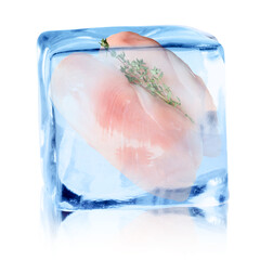 Fototapeta premium Chicken breasts in ice cube on white background. Fresh meat