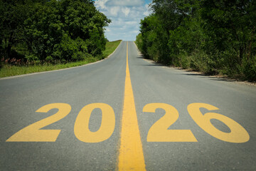 New 2026 Year. Yellow numbers written on asphalt road