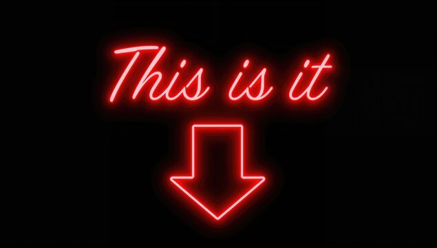 Red neon sign displaying the phrase THIS IS IT with a downward arrow on a dark backdrop - Powered by Adobe