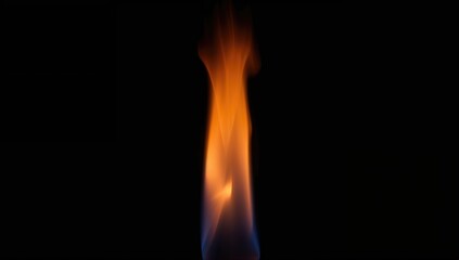 Jet of flame emitted from a gas burner against a black background