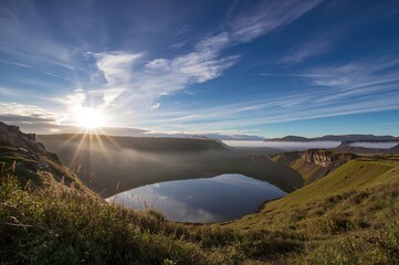 Volcanic crater region with water and sky in a natural setting during summer and winter seasons