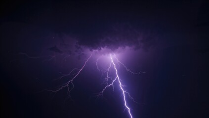 Nighttime sky illuminated by lightning