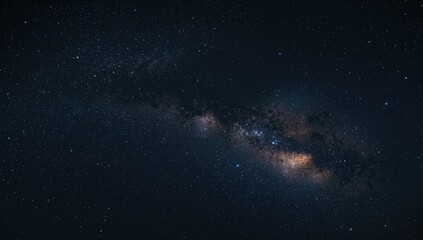 Obraz premium Wide-angle view of the Milky Way galaxy against a pitch-black sky with visible stars. Cosmic expanse captured with long exposure and balanced white tones, featuring natural grain and noise.