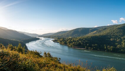 Fototapeta premium Scenic view of a watercourse meandering across the terrain