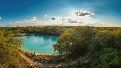 Obraz premium Aerial view of the vibrant blue ponds at Touverac
