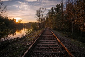 Fototapeta premium The deserted children's railway blends seamlessly with the surrounding wilderness, evoking a sense of peace and enigma.