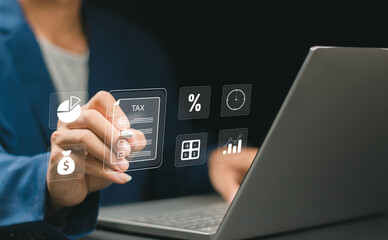 E-tax, Taxpayer using laptop filling out tax forms online for tax payment. State taxes, data analysis, paperwork, financial research, report VAT and property tax of business.
