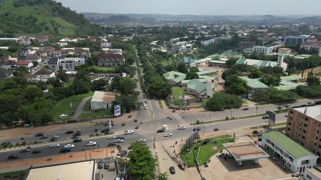 A typical Nigerian City. This aerial video was taken in Apo Abuja Nigeria October 2025 showcasing the green areas, road networks and building around Apo-Gudu Axis.