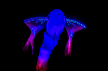 Long exposure of brightly lit objects floating in the night sky