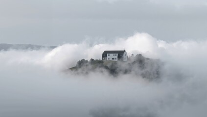 House Situated on a Foggy Hilltop