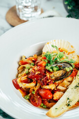 A close-up shot of a delicious pasta dish with seafood