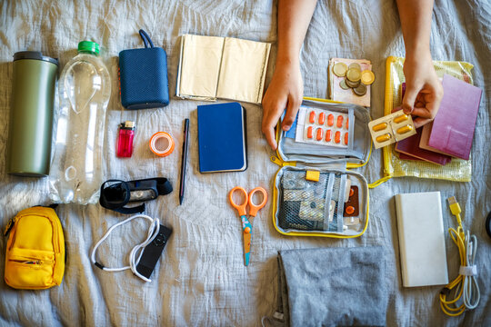 Medical aid organization - close-up of women's hands with medicines