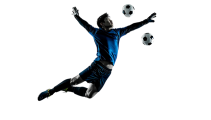 Goalie mid-air leaping to block two soccer balls against a stark black background, in dynamic, silhouetted action