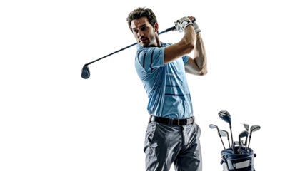 Golfer in action. Man swinging a golf club, mid-swing. Black background. Golf bag in the right, full of clubs