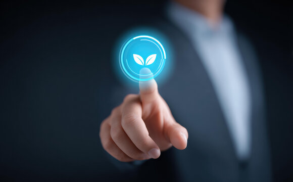 Focused businessman touching green technology icon. hopeful concept for business sustainability, environment, ecology, ESG and clean future for our world - Powered by Adobe