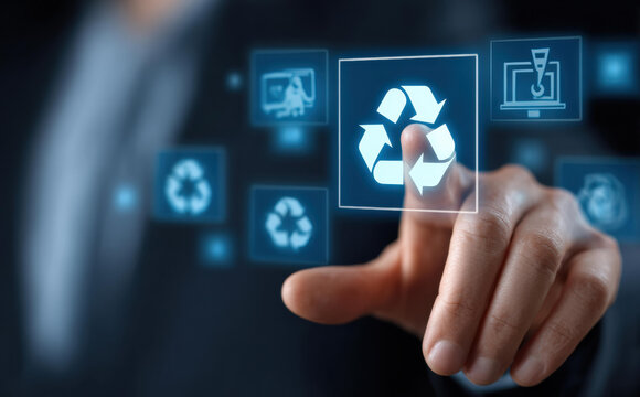 Businessman hand touching glowing recycle icon on virtual screen. focused technology and business concept for environment sustainability and responsible e waste management
