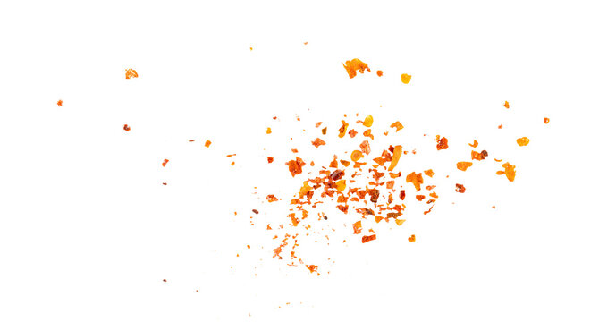 Flying crushed chili flakes, scattered red pepper particles with golden seeds, hot spicy seasoning explosion for cooking ingredient design and gourmet food composition illustration