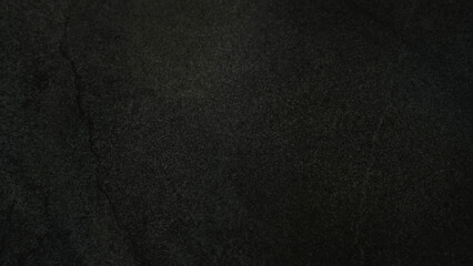 Dark abstract background with a deep tile-like texture, suitable for text, artwork, branding, or various design elements as desired.