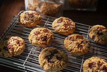 dark chocolate chunk oatmeal cookies on cooling rack.