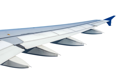 Close-up of airplane wing in flight, showing flaps and wingtip, against black background