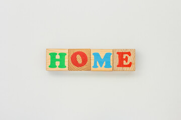 Wooden Alphabet Blocks Forming Home