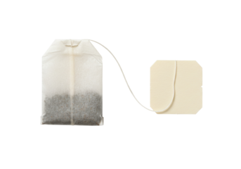 Tea bag with label isolated PNG, herbal beverage bag on transparent background for hot drink preparation and relaxation