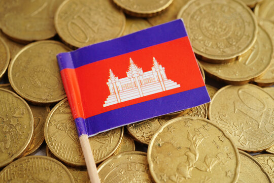 Cambodia flag on coin and banknote money, finance trading investment business currency.