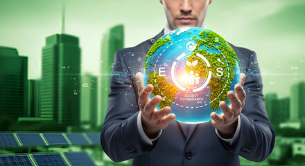 The businessman is using a hand to touch the virtual screen of a digital globe, symbolizing global business and future technology