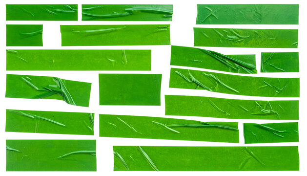 Green rectangles, overlapping and taped, arranged in a brick-like design with varying shades
