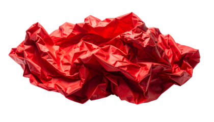 A vibrant red crumpled fabric appears floating against a stark black background