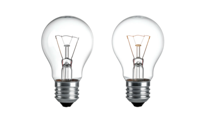Two clear light bulbs, one off, one lit, on a black background with metallic bases