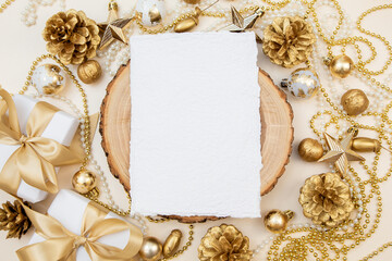 Merry Christmas and Happy New Year greeting card, frame, and banner. Holidays design. Noel and Feliz Navidad. Gifts and decorations, top view, flat lay. Text space, copy space winter background.