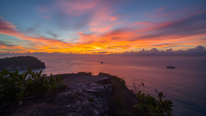 A picturesque sunset on the Andaman Sea at Windmill View Point, near Laem Promthep Cape, Phuket, Thailand