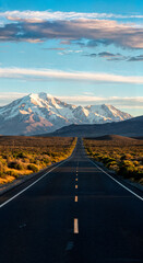 Road leading to snowy mountains