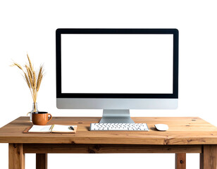 Computer setup on wood desk coffee cup, notebook, wheat grass, and mouse complete the workspace against a black background