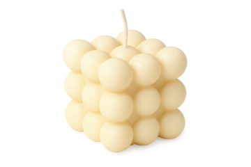 Cream-colored cube candle formed by stacked spheres with single wick