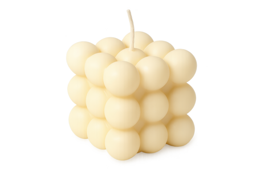 Cream-colored cube candle formed by stacked spheres with single wick