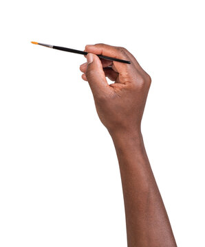 Man holding an art brush in hands and painting isolated on white or transparent background 