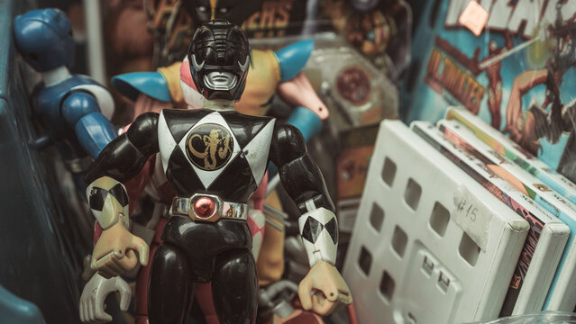 Guayaquil, Ecuador &ndash; July 27th, 2025: Black Power Ranger action figure displayed among other toys and comics at a public collector sale.