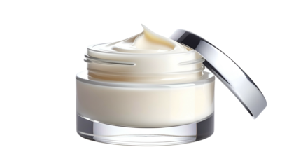 A partially open jar of face cream, with a swirl of product visible. Dark background