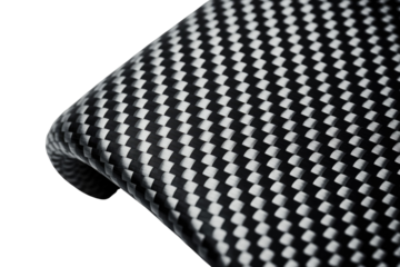 Close-up of a carbon fiber composite material, featuring its distinct black and white woven pattern and subtle texture on a transparent background. background removed