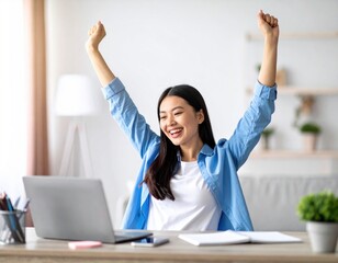 A joyful woman celebrates success while working on her laptop at home, showcasing a positive and motivated mindset.