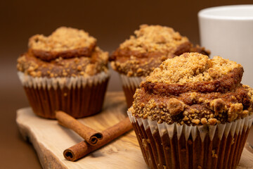 Pumpkin Muffins with Cinnamon – Cozy Autumn Baking Scene with Coffee and Warm Tones