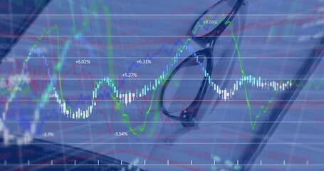 Resting eyeglasses blending with financial chart elements on tablet in workspace, copy space