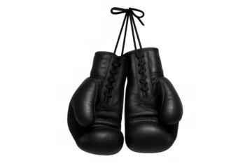 Pair of vintage black leather boxing gloves hanging by laces, symbolizing boxing, fighting, and combat sports. Transparent background